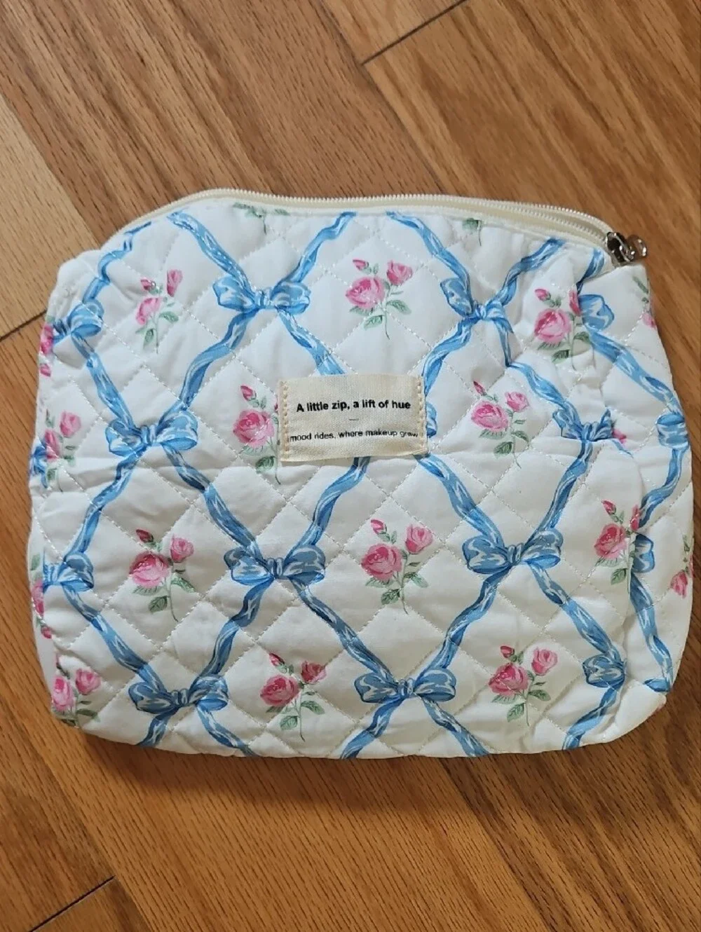 NWOT Quilted Floral Cosmetic Pouch in White with Blue Ribbon Print